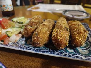 Croquetas de espinacas y champiñones, buenísimas at El Piano in Granada
