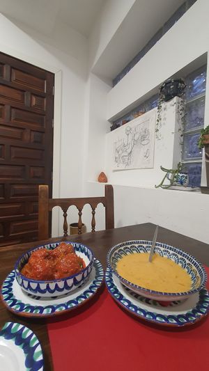 Media racion de albondigas y una de crema de puerro at El Piano in Granada