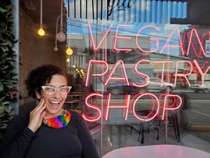 Me with the adorable sign out front. (You can sit outside!) #Veganuary at Gia Vegan Pastries in San Pedro