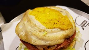 Tofu egg on Xzão burger (R$22). Bland and mushy. at Paprica Vegan in Curitiba