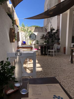 Cute garden seating area at Chaya & Cacao in Isla Mujeres