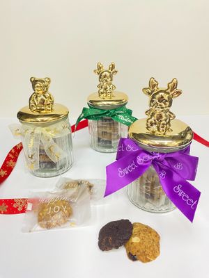 An assortment of 3 gluten-free vegan cookies in a cute festive glass jar - gingerbread man, cranberry pumpkin seeds and double chocolate chip. No refined sugar. Ideal Xmas gift. at Sweet Secrets in Kowloon