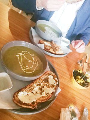 Creamy broccoli soup and marinated olives at Little Green in Newcastle Upon Tyne