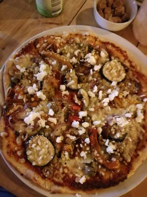 Vegan Mediterranean pizza with vegan feta crumbles at Little Green in Newcastle Upon Tyne
