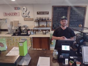 A proud owner of a happy place at The Green Spork in Richmond Hill