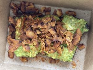 Avocado toast with coconut bacon and tajín  at The Green Spork in Richmond Hill