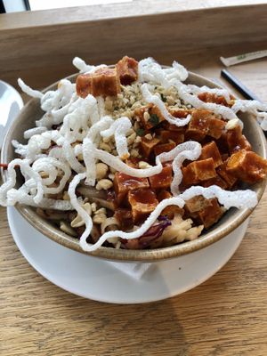 Noodle Bowl - spicy tofu, rice noodles, cabbage, carrot and beet, cashews, cilantro, mint, basil, sesame, soy and ginger at Heirloom Vegetarian in West Vancouver
