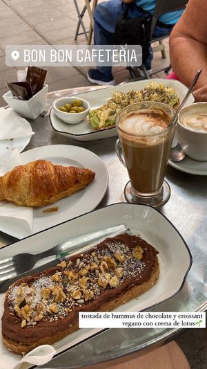 Breakfast! (chocolate hummus toast and vegan croissant with vegan chocolate and a hazelnut latte, my mum’s option wasn’t vegan, she had avocado toast with scrambled eggs)  at Bar Poxé in Mallorca