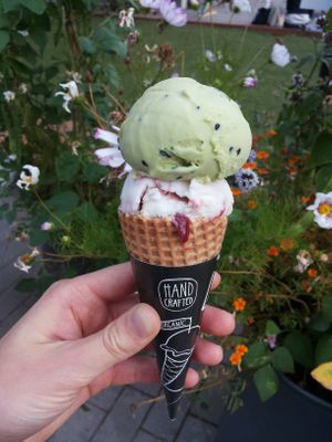 Vegan almond-based cherry and matcha with black sesame seeds  at La Muu in Tallinn