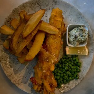 Fish and chips with tartar sauce  at Erpingham House in Norwich