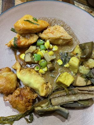 Tofu dish, chips and more   at Veggie Castle - Yen Ninh in Hanoi