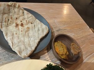 House made flatbread with carrot and some other dip.  Also so good! at Vicia in St Louis