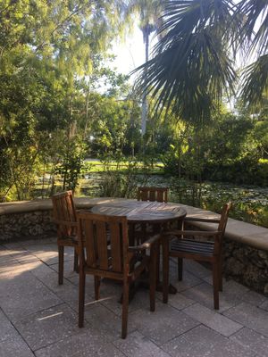 Our favorite table overlooks a lily pond. at Sealantro in Vero Beach