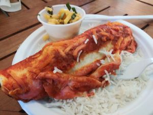 Enchilada with mango salsa and rice at Sealantro in Vero Beach
