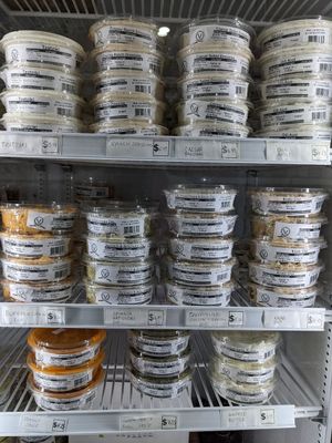 Dips and spreads made in house at Coven Plant Based Marketplace in Hamilton