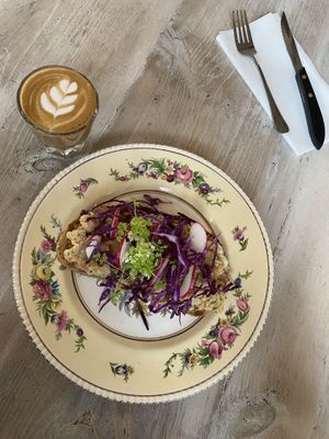 Chickpea Toast with oat milk Cortado  at Fiddlehead Fern Cafe in St Louis
