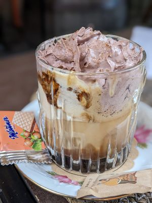 Iced coffee with vegan ice cream and chocolate whipped cream at Kavarna Bodi in Ptuj