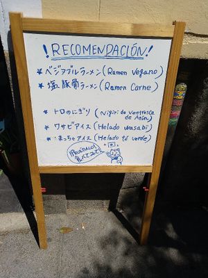 outside sign advertising vegan ramen at Yan Ken Pon - La Latina in Madrid