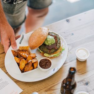 The Gran Vegano Burger: Our crispy chickpea spinach patty, tomato chutney and whipped avocado. Without mayo. at Bacoa - Kiosko in Barcelona