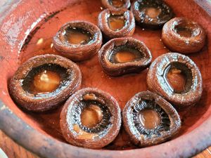 Fried mushrooms, done in oil once I specified vegan. Soooo good. Cooked in the clay pot with a light herb. Just divine. at Machakhela in Tbilisi