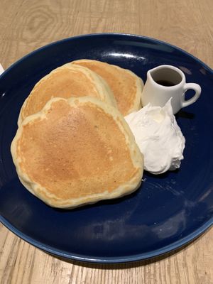 Pancakes with maple syrup and whipped cream at Shiro Cafe in Tokyo