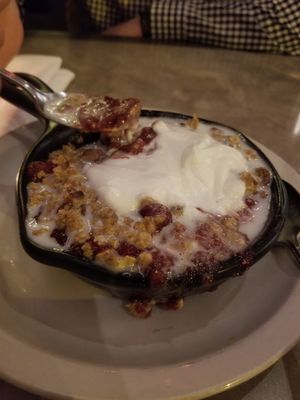 Apple cranberry cobbler with coconut whipped cream at Pastabilities in Syracuse