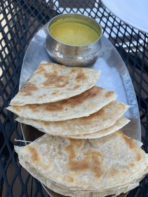 Roti paratha and curry dip. Roti came out hot and fresh, and the curry dip was perfect, with little chunks of potato in it. A must try.  at Sambal Thai & Malay in Irvington