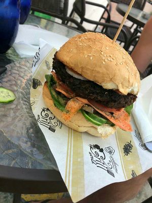 The vegan burger with carrots, cucumber, Champignon, olives and a sauce and of course the delicious fresh pattie at Mad Irie in Crete