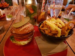 Chicken burger with cheesy curly fries at Hell Below in Carlisle