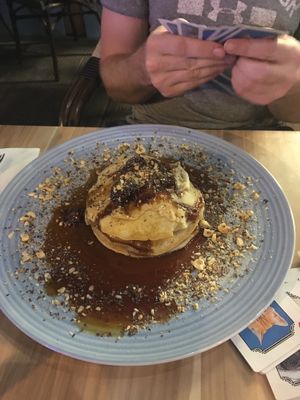 Banana, maple syrup and peanut butter pancakes  at Mingle Cafe in Larnaca