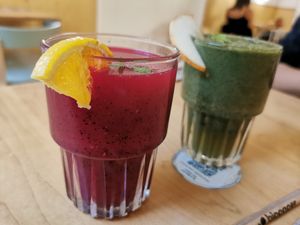 Dragon fruit juice (front) and immunity juice (back) at Noshi Coffee in Porto