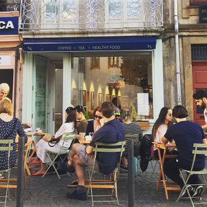 this is the outside at Noshi Coffee in Porto