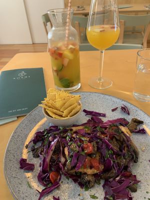 Avocado toast & sangria  at Noshi Coffee in Porto