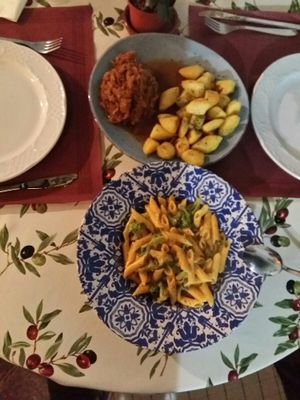 Penne with broccoli and Polish sauerkraut stew with potatoes at Meson Mudejar in Archez