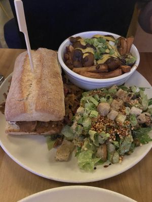 Lola Cheese steak with a side of poutine and Caesar salad   at Lola Rosa - Places des Festivals in Montreal