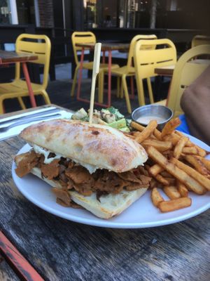 Cheesesteak with white sauce, fries and Caesar  at Lola Rosa - Places des Festivals in Montreal