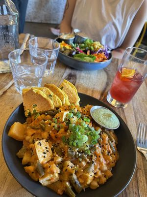 Curry, Rosa salad and iced tea  at Lola Rosa - Places des Festivals in Montreal