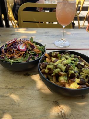 Poutine and garden salad!  at Lola Rosa - Places des Festivals in Montreal