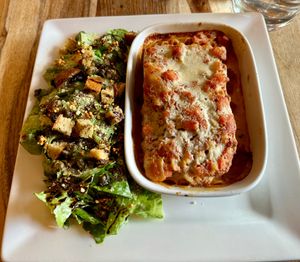 Lasagna and Cesar salad.  at Lola Rosa - Places des Festivals in Montreal