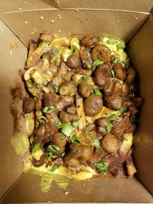 Yummy mushroom poutine! at Lola Rosa - Places des Festivals in Montreal