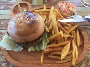 Veggie burger with homemade fries and coleslaw  at The Three Bears in Moalboal