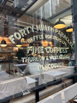 Inside & outside seating  at 49th Parallel Coffee Roasters & Lucky's Doughnuts in Vancouver