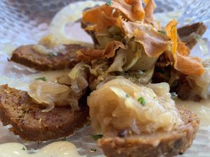 Seitan streaks with potatoes and mustard sauce  at Amaranta in Girona