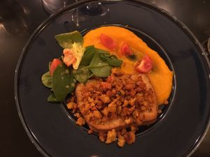 Marinated tofu with cornbread, tomato and coriander gratin, seasonal vegetable purée and salad at The Green Affair - Saldanha in Lisbon
