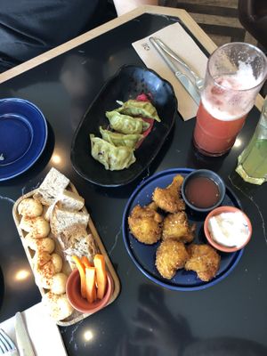 Vegtable gyozas, humus bread and carrots & cauliflower wings at The Green Affair - Saldanha in Lisbon
