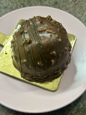 Rocher pastry  at Patisserie Chocolaterie Peigné in Lille