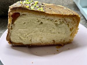 Inside pistache croissant  at Patisserie Chocolaterie Peigné in Lille