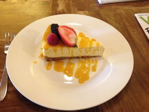 vegan cheesecake with mango coulis  at Padmanadi in Edmonton