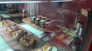 Sweets in the cabinet at Nevedya in Upwey