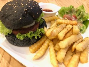 Tom yam burger with fries at Green Ba - Marina Sq in Central Singapore